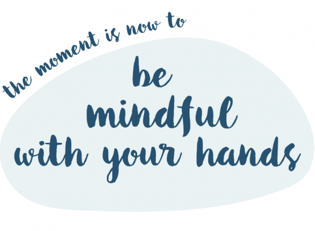 This pebble says "be mindful with your hands"
